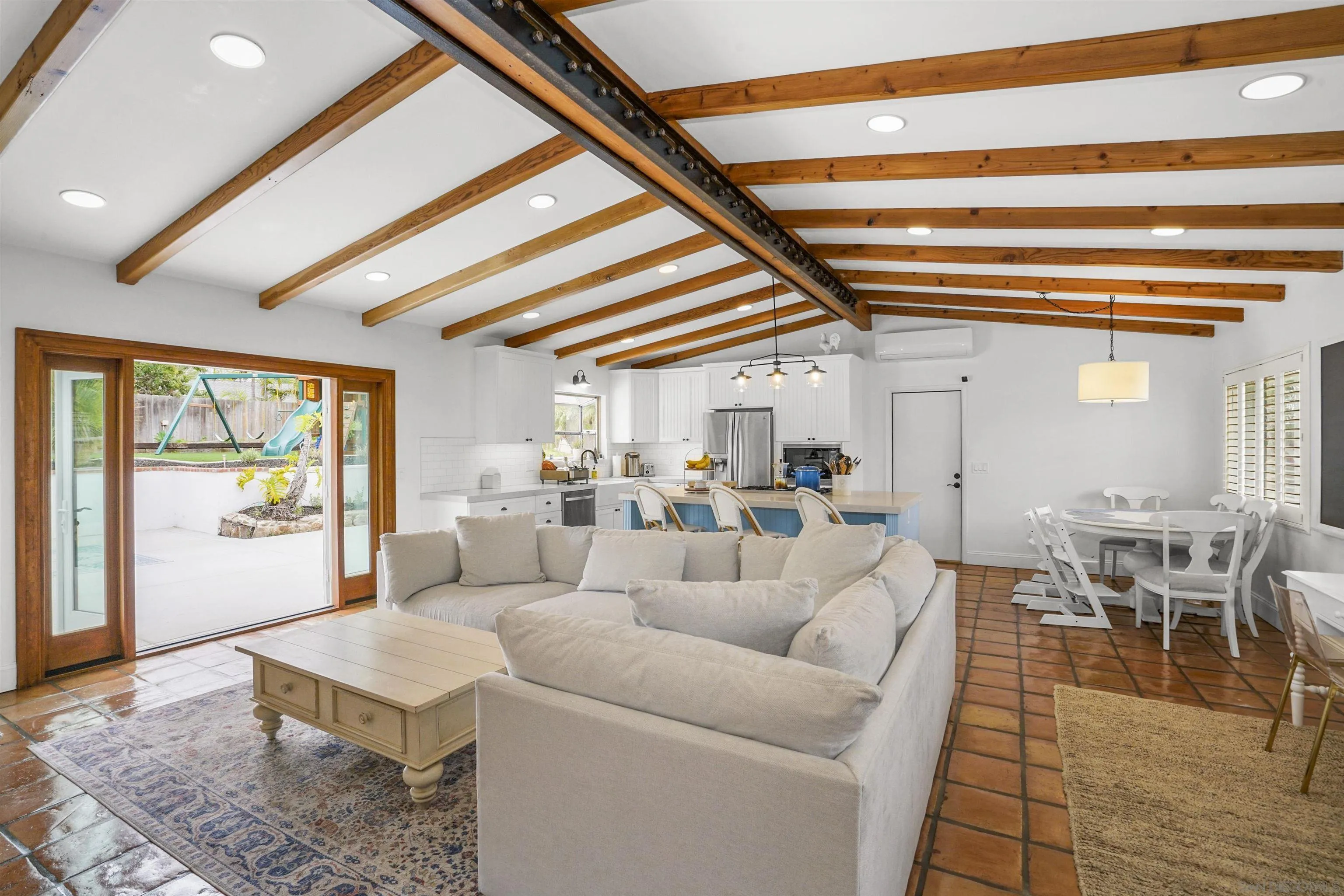 1235 Blue Sky Drive Cardiff, CA 92007 - Photo 7 of 35 a living room with furniture and a table