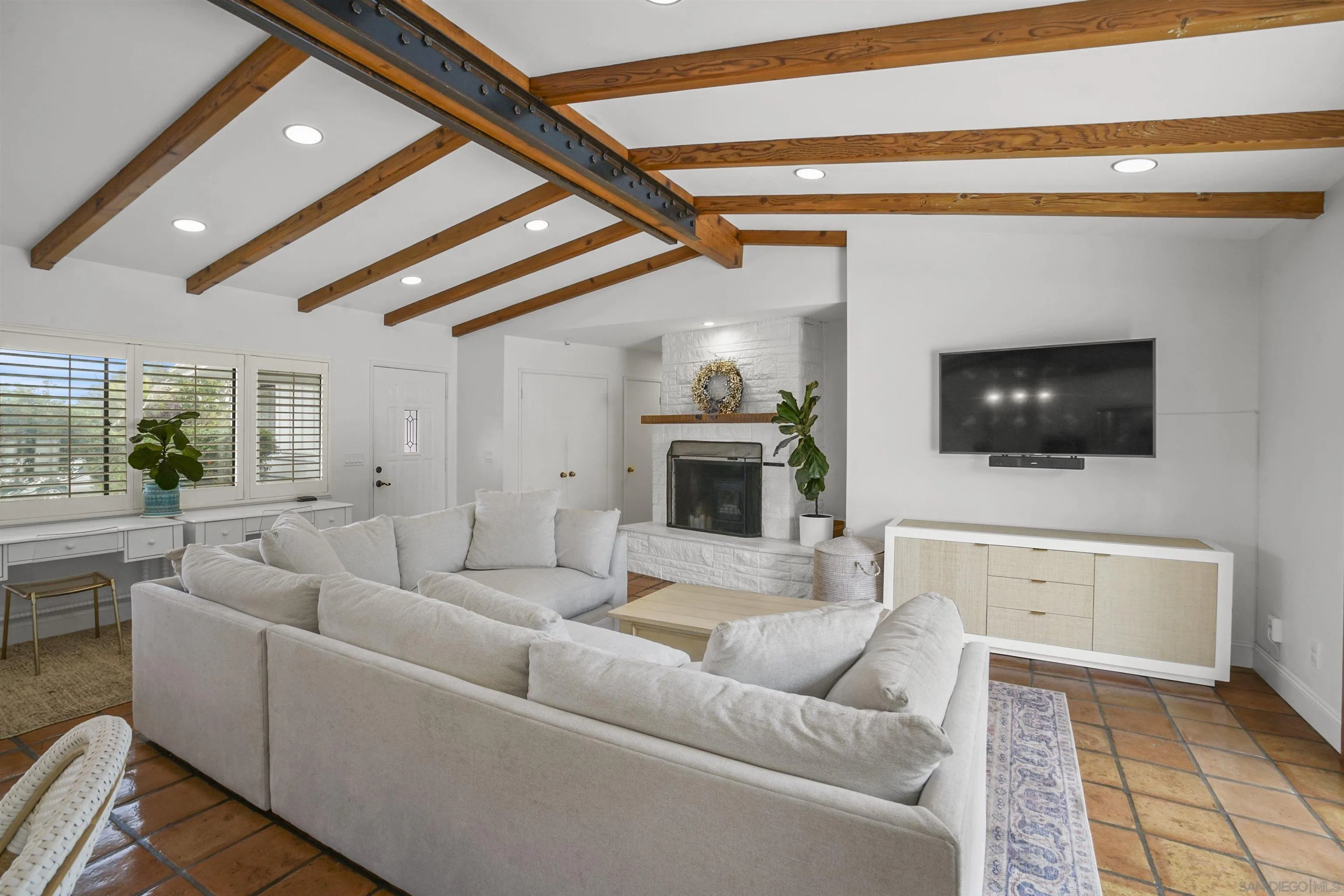 1235 Blue Sky Drive Cardiff, CA 92007 - Photo 8 of 35 a living room with furniture and a flat screen tv
