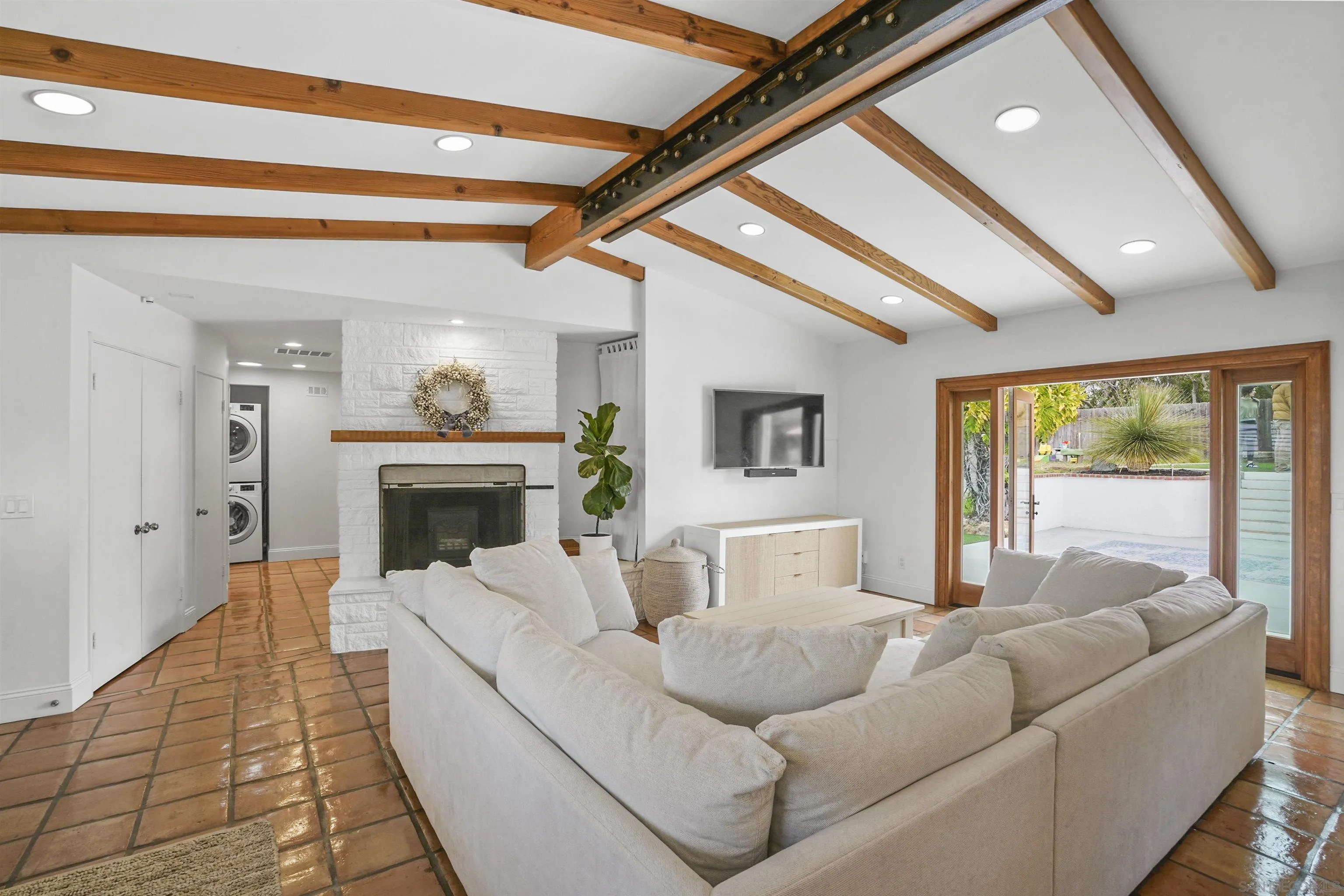 1235 Blue Sky Drive Cardiff, CA 92007 - Photo 9 of 35 a living room with furniture and a fireplace