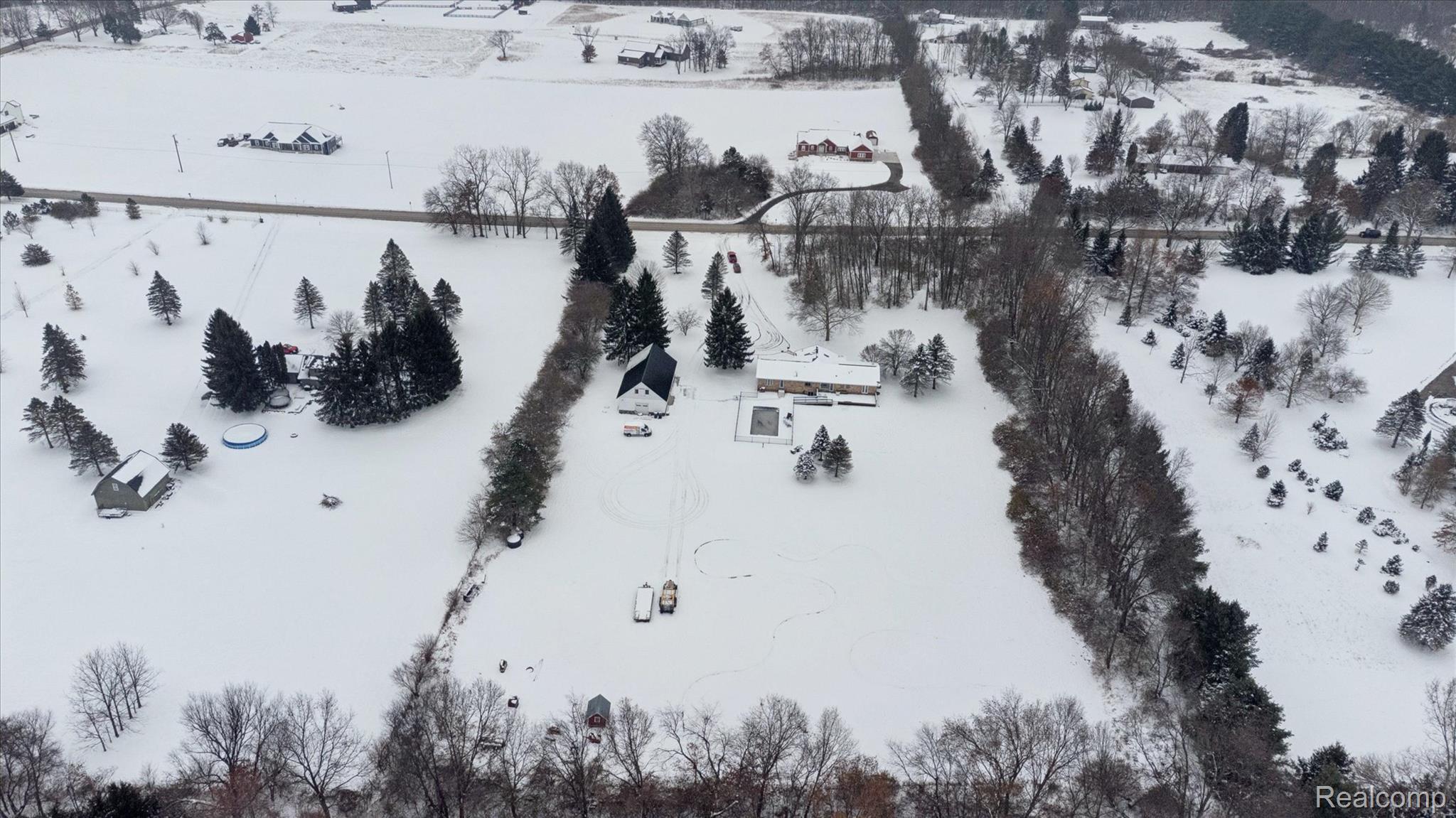 187 Darwin Road Pinckney, MI 48169 - Photo 70 of 71 View of snowy aerial view