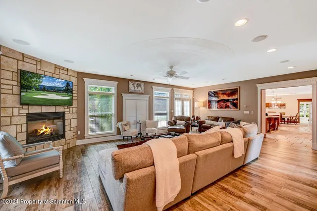 a kitchen with stainless steel appliances granite countertop a sink and a stove