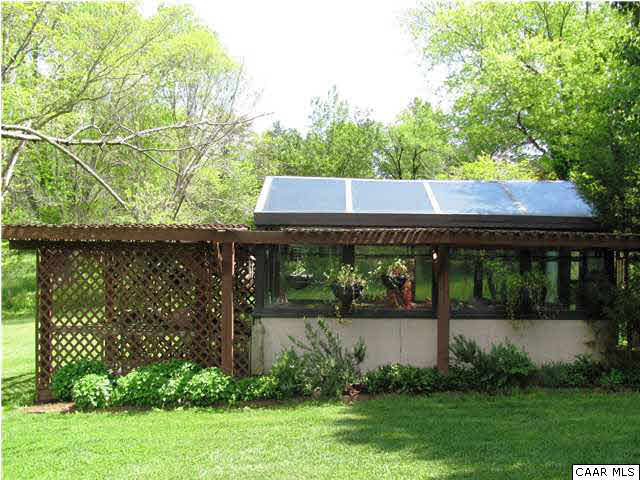 3406 Keswick Road Keswick, VA 22947 - Photo 17 of 28 a view of a house with garden