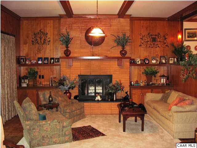 3406 Keswick Road Keswick, VA 22947 - Photo 24 of 28 a living room with furniture and a fireplace
