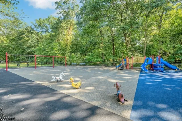 a view of a park with swings
