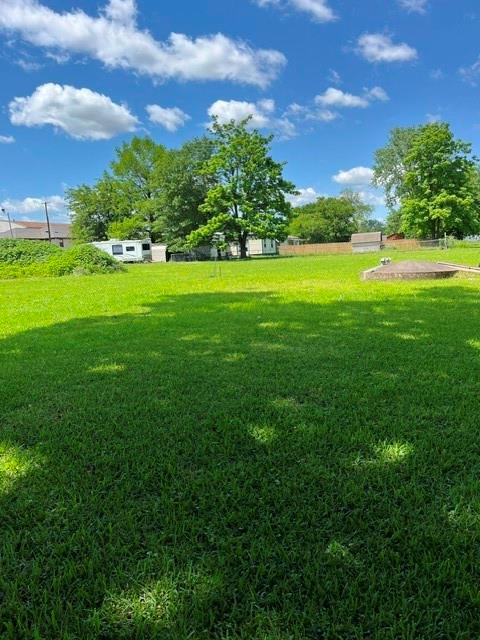 304 Sunset Street Roxton, TX 75477 - Photo 31 of 31 a view of a golf course with a lake