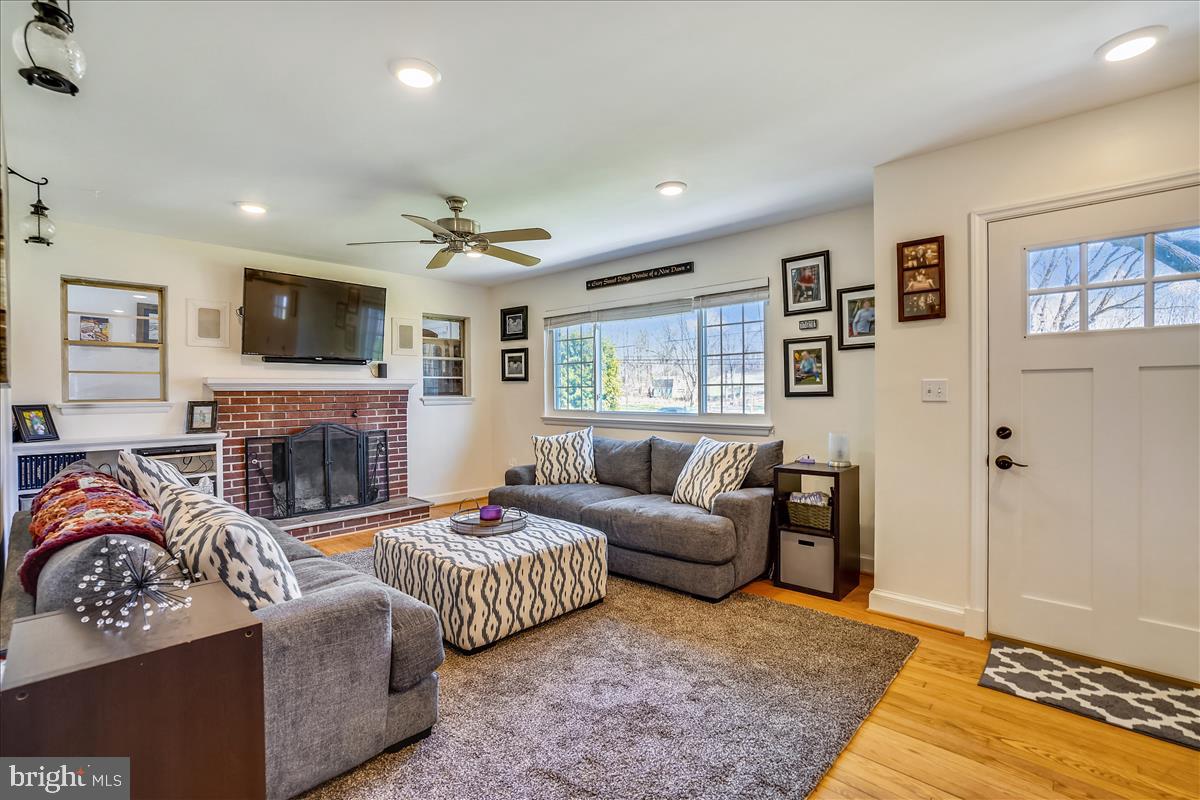 28700 Ridge Road Mount Airy, MD 21771 - Photo 6 of 44 Living room with wood fireplace