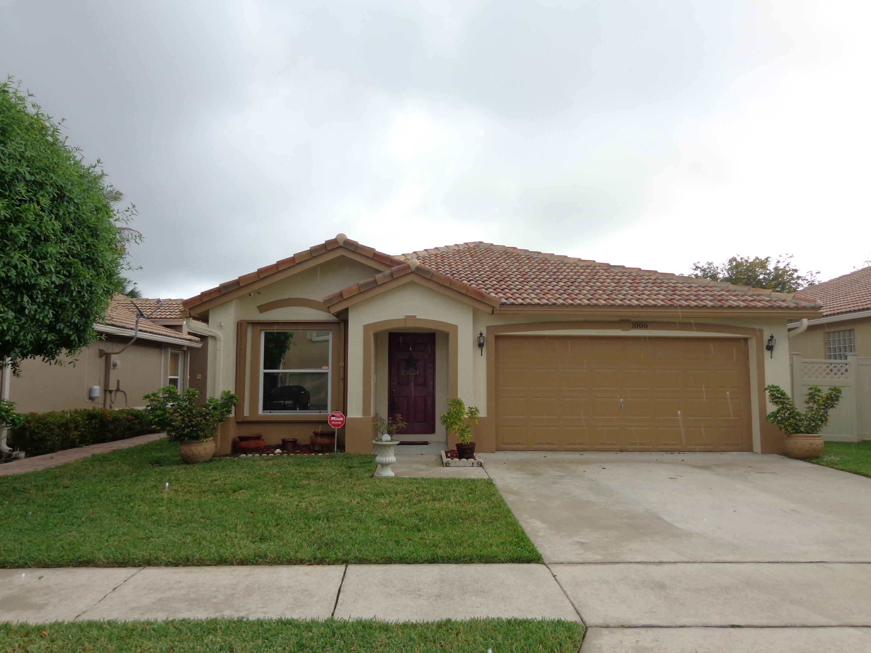 1006 Fosters Mill Road Boynton Beach, FL 33436 - Photo 1 of 18 Home Front