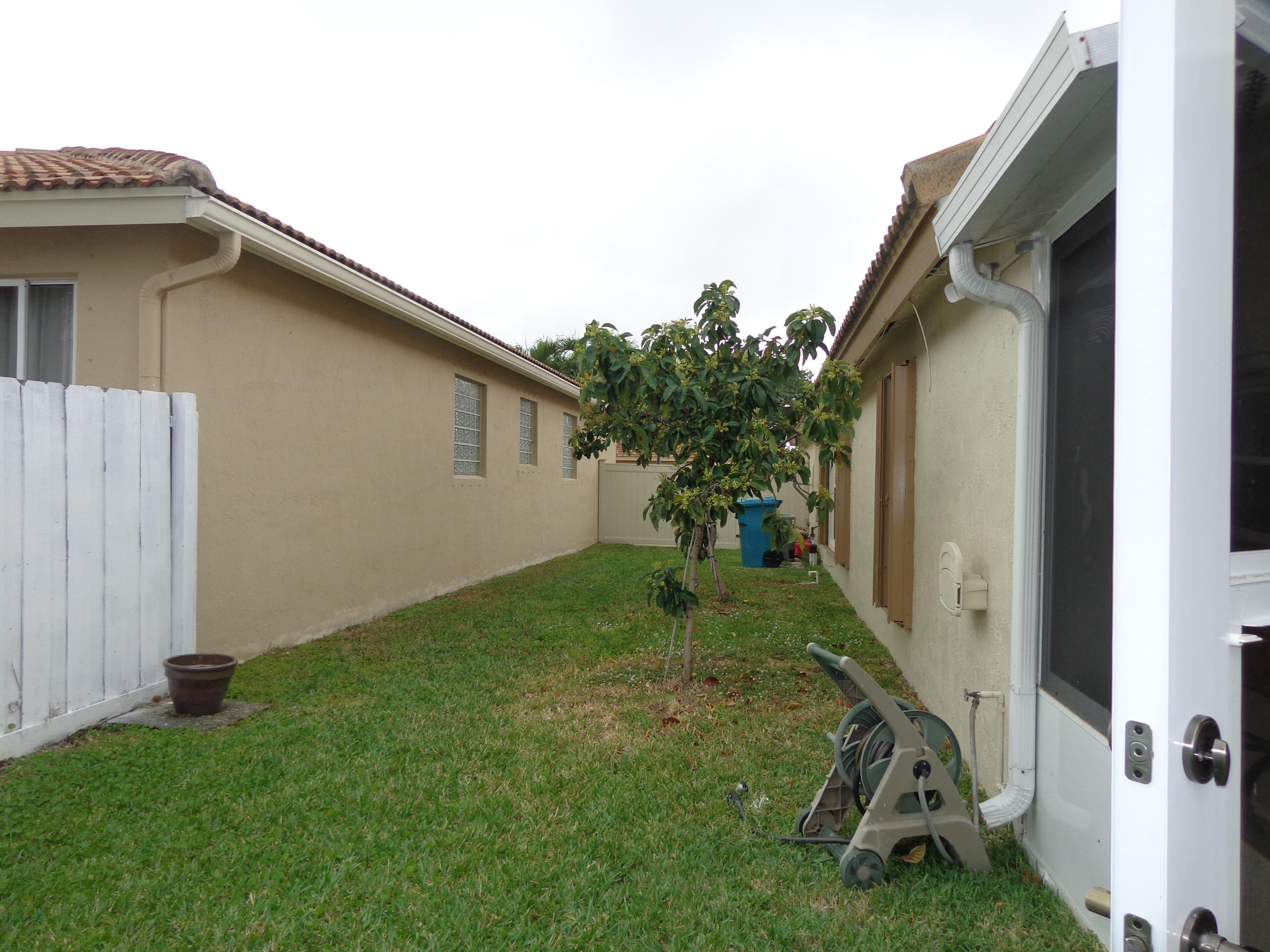 1006 Fosters Mill Road Boynton Beach, FL 33436 - Photo 15 of 18 Side of Home