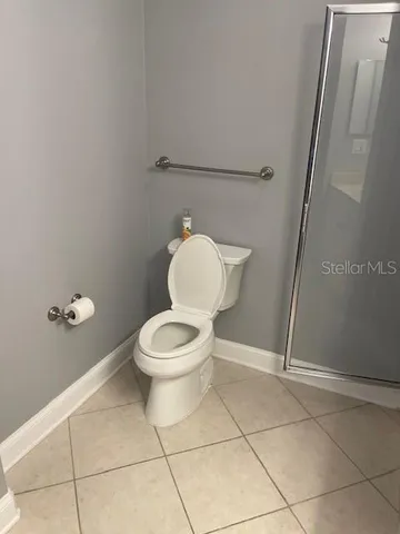 a bathroom with a sink toilet and vanity