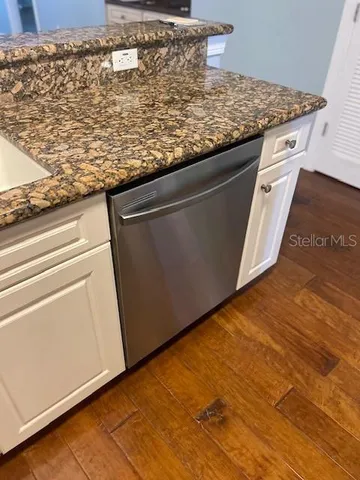 a view of a refrigerator in the kitchen