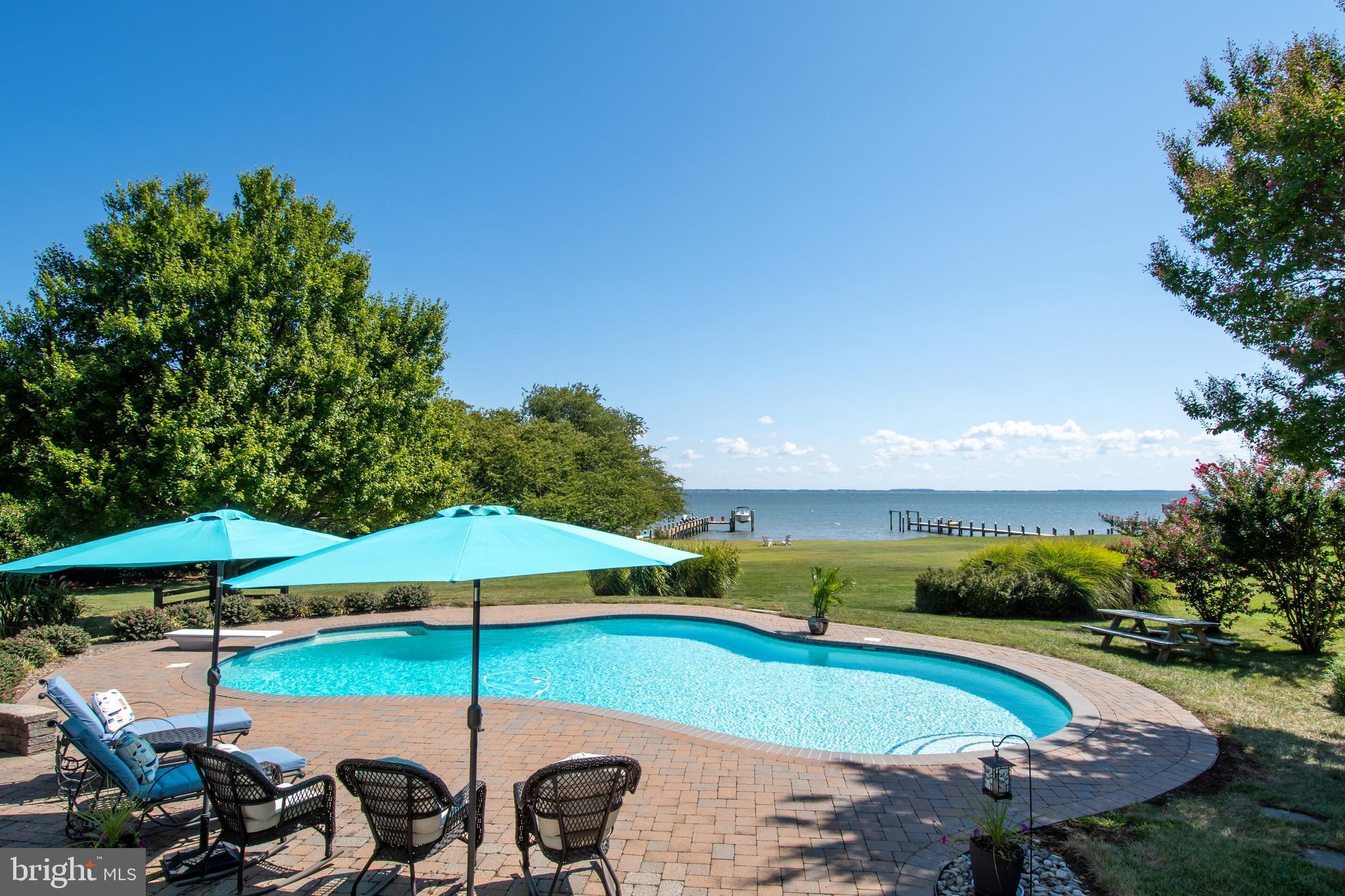 2861 Cox Neck Road Chester, MD 21619 - Photo 59 of 79 an outdoor space with swimming pool and furniture