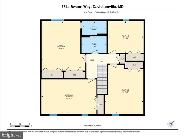 a front view of a house with a yard table and chairs