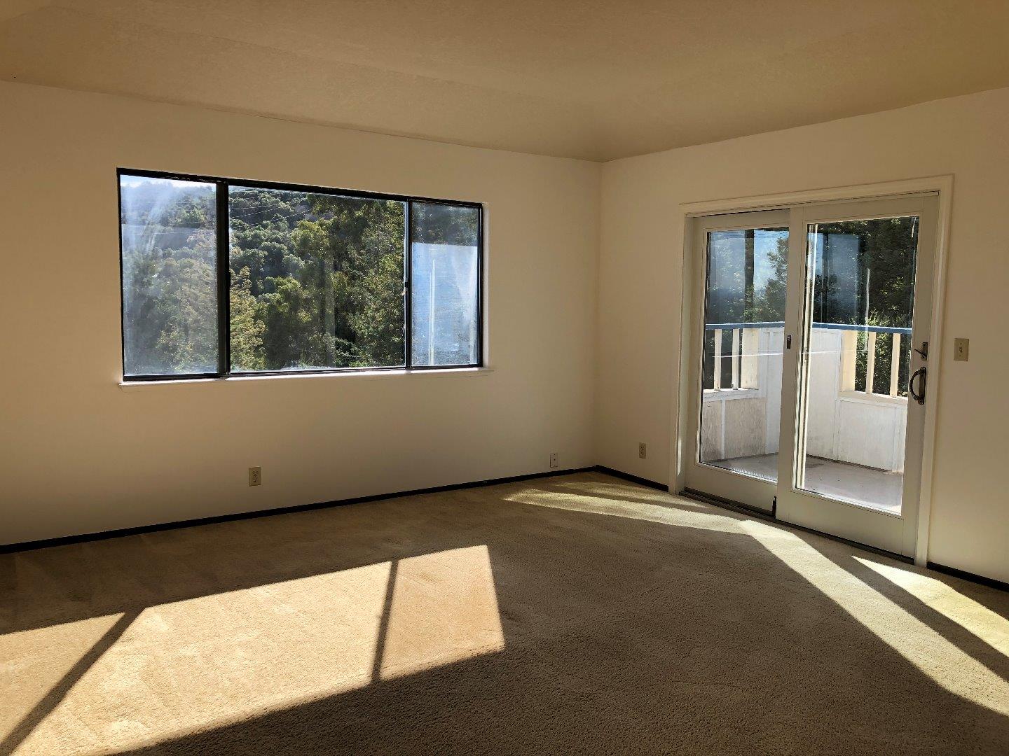 23025 Voss Avenue Cupertino, CA 95014 - Photo 26 of 45 a view of an empty room with a window