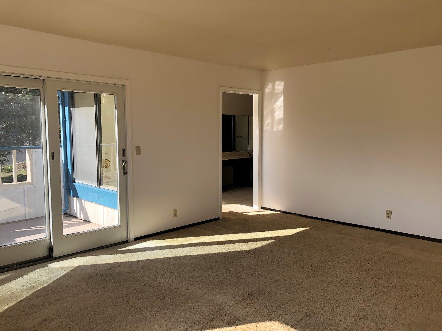 23025 Voss Avenue Cupertino, CA 95014 - Photo 27 of 45 a view of an empty room with window