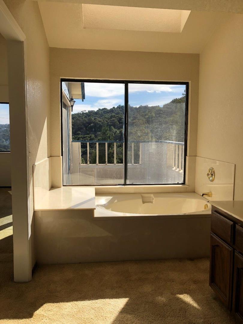 23025 Voss Avenue Cupertino, CA 95014 - Photo 31 of 45 a view of a living room with a large window