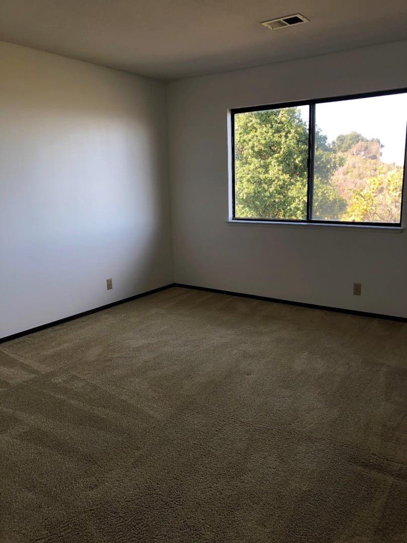 23025 Voss Avenue Cupertino, CA 95014 - Photo 32 of 45 a view of an empty room with a window
