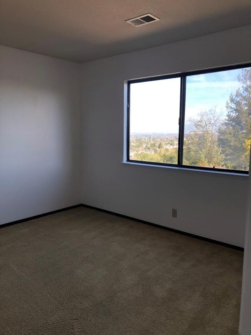 23025 Voss Avenue Cupertino, CA 95014 - Photo 34 of 45 a view of a room that has a window in it