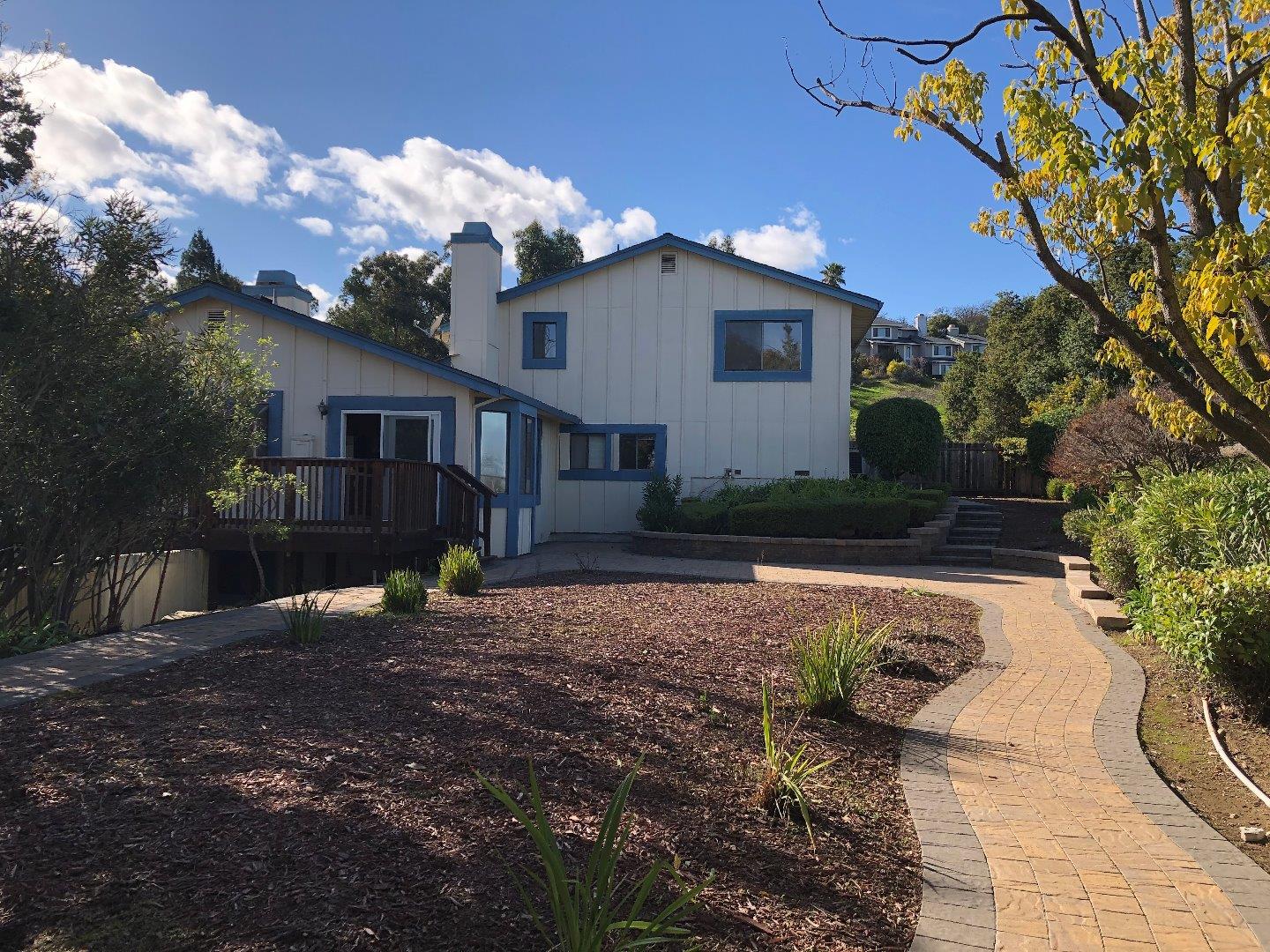 23025 Voss Avenue Cupertino, CA 95014 - Photo 40 of 45 a front view of a house with garden
