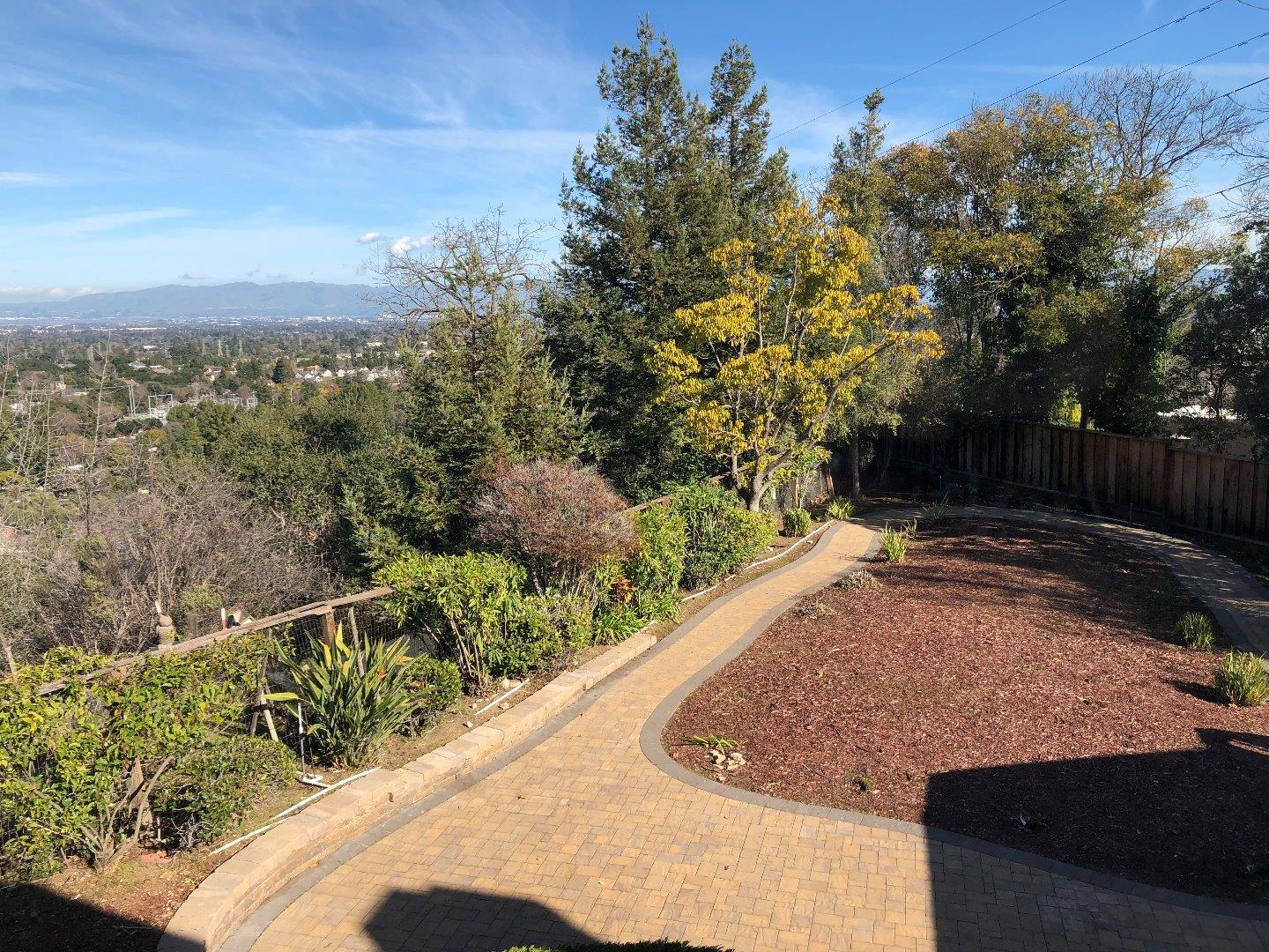23025 Voss Avenue Cupertino, CA 95014 - Photo 41 of 45 a view of a backyard of the house