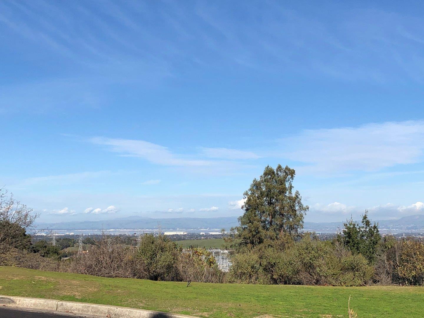 23025 Voss Avenue Cupertino, CA 95014 - Photo 42 of 45 a view of a green field with sky view