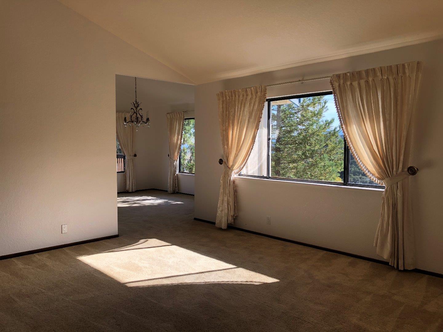 23025 Voss Avenue Cupertino, CA 95014 - Photo 5 of 45 an empty room with windows