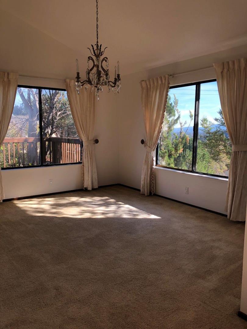 23025 Voss Avenue Cupertino, CA 95014 - Photo 7 of 45 a view of a livingroom with a flat screen tv
