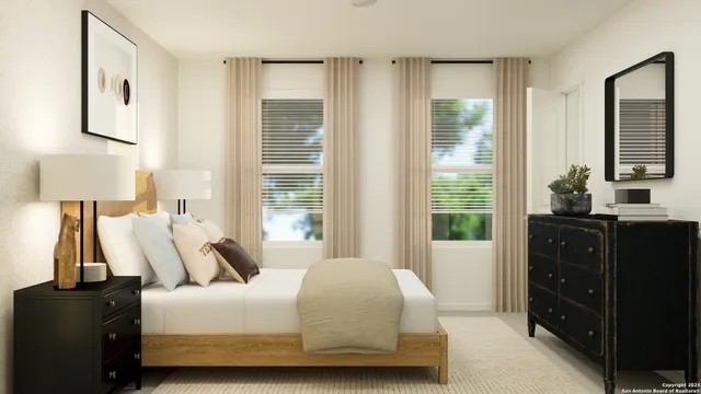 a bedroom with a bed and window