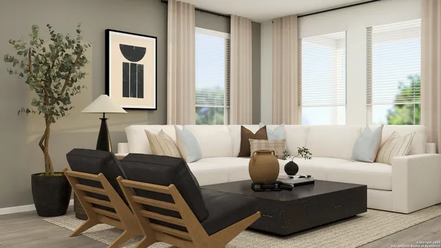 a living room with furniture and a window