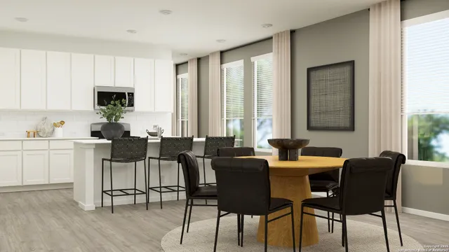 a view of a dining room with furniture