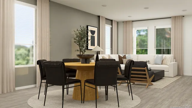 a dining room with furniture and windows