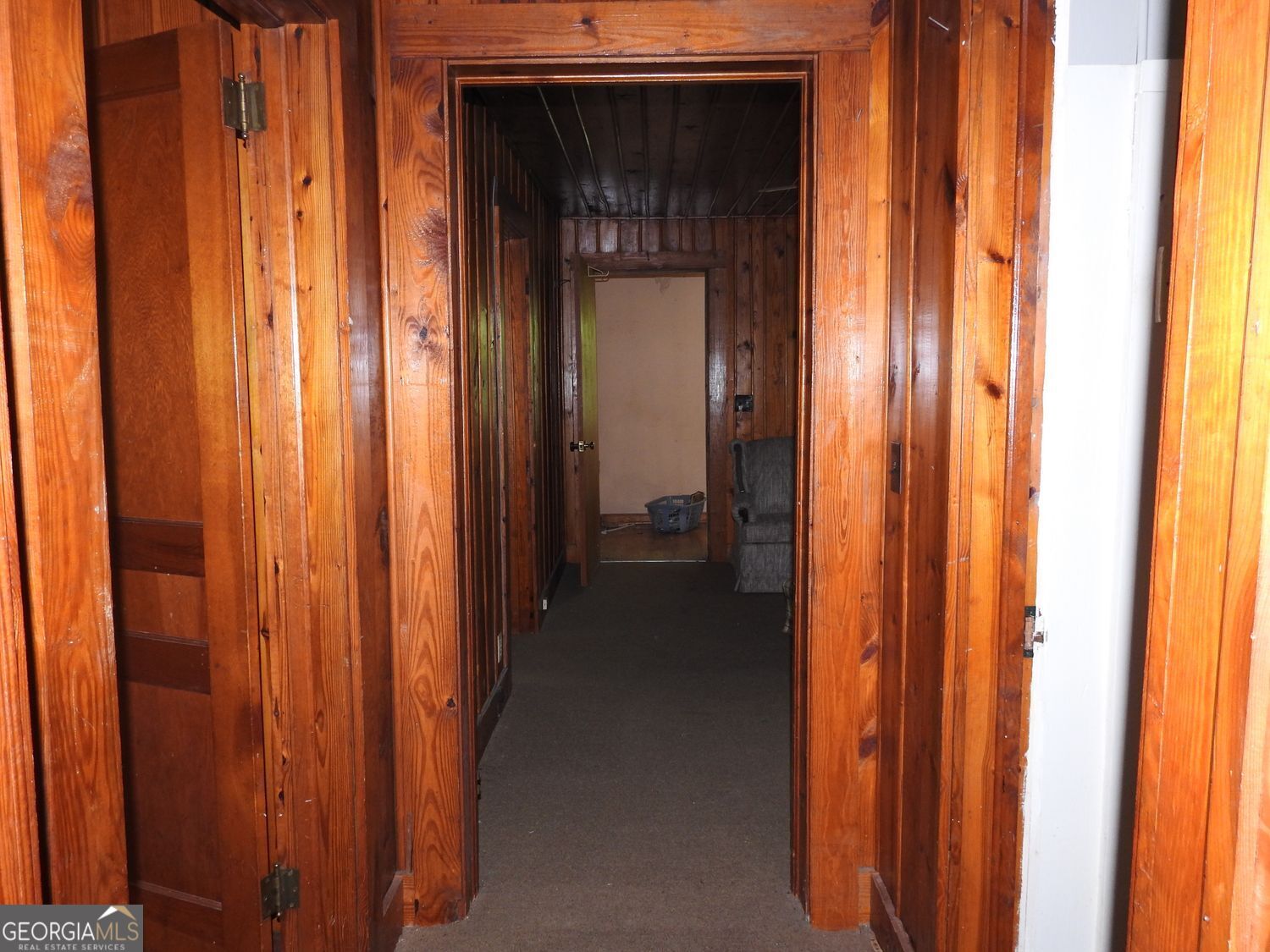 333 Lickskillet Road Epworth, GA 30541 - Photo 35 of 38 a view of a hallway with a wooden door