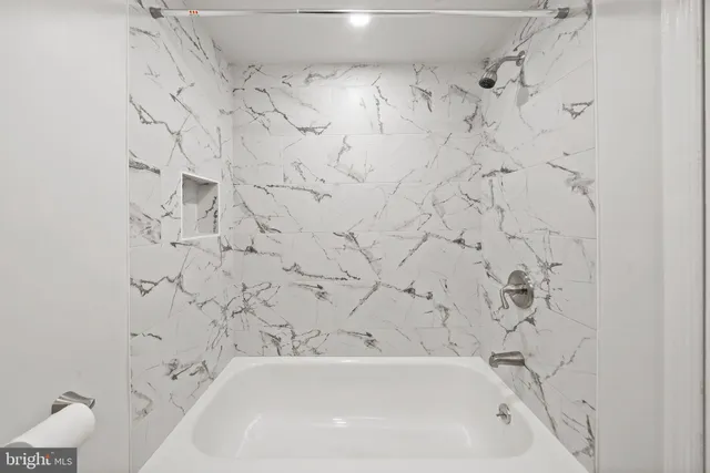 a bathroom with a bathtub