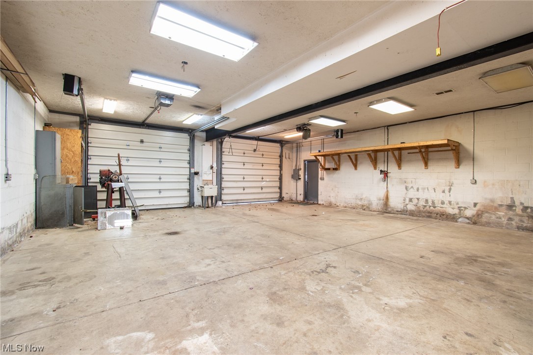 6038 Tippecanoe Road Canfield, OH 44406 - Photo 31 of 34 Garage with a garage door opener