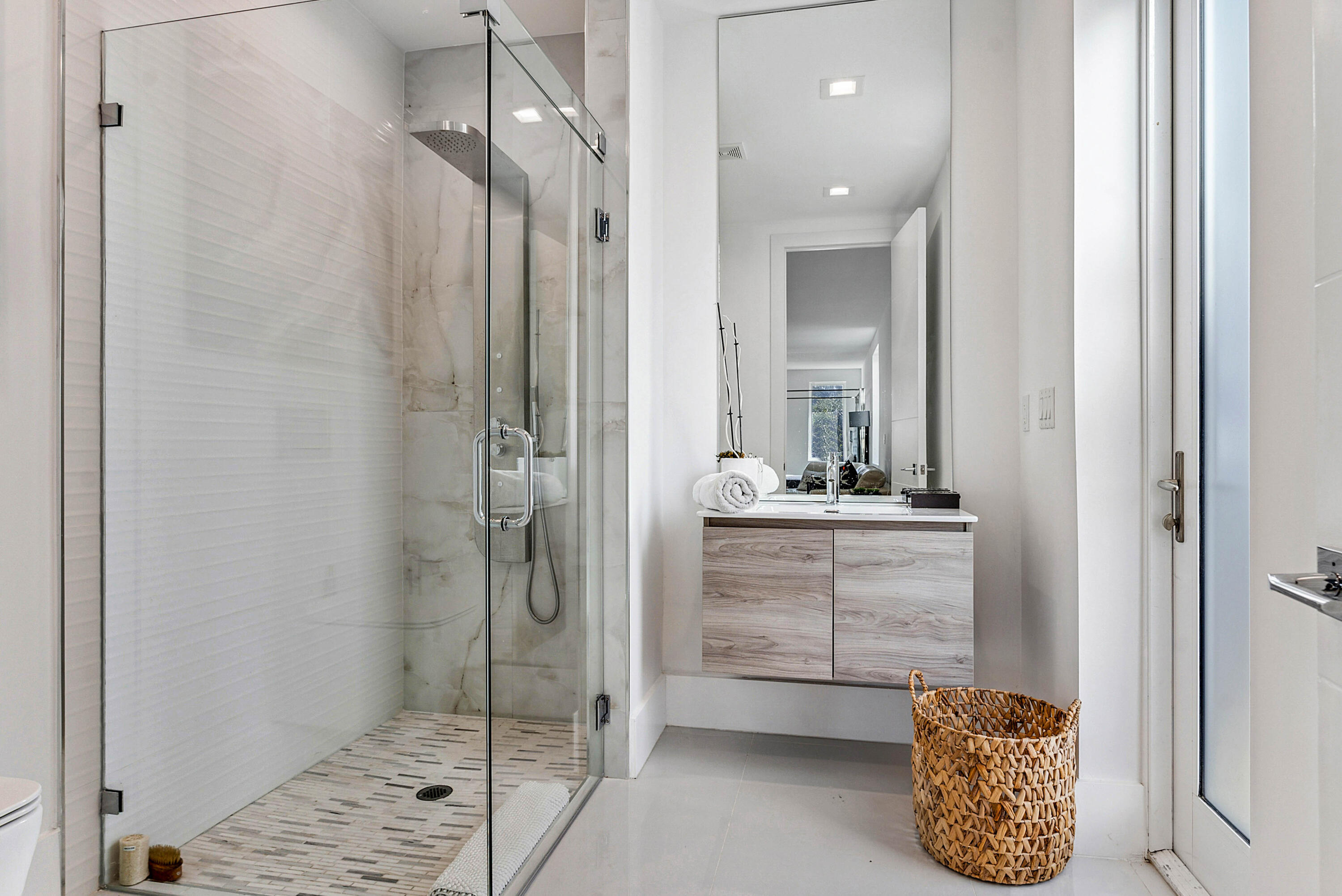 4422 North Hwy A1A Hutchinson Island, FL 34949 - Photo 23 of 86 a bathroom with a shower and a sink