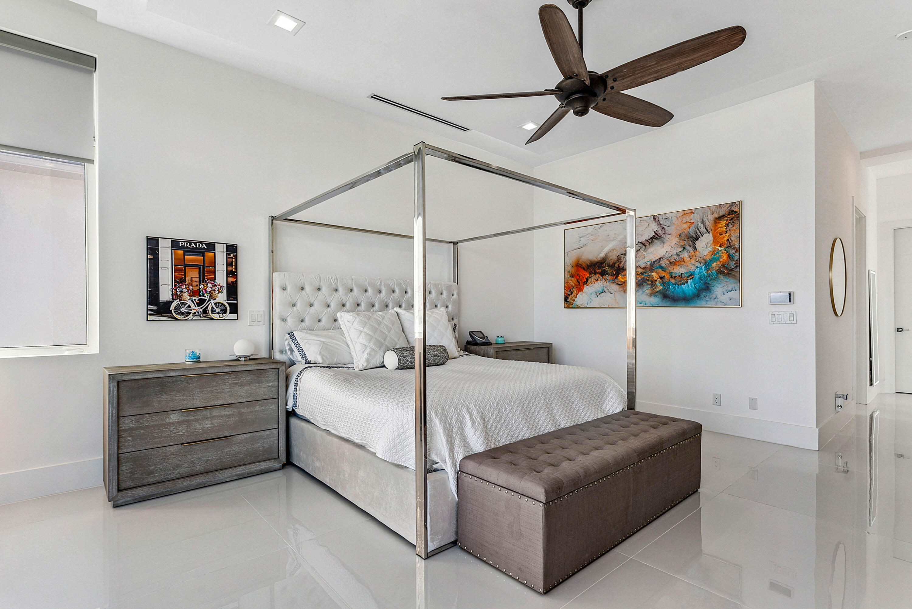 4422 North Hwy A1A Hutchinson Island, FL 34949 - Photo 28 of 86 a bedroom with a bed couch and window