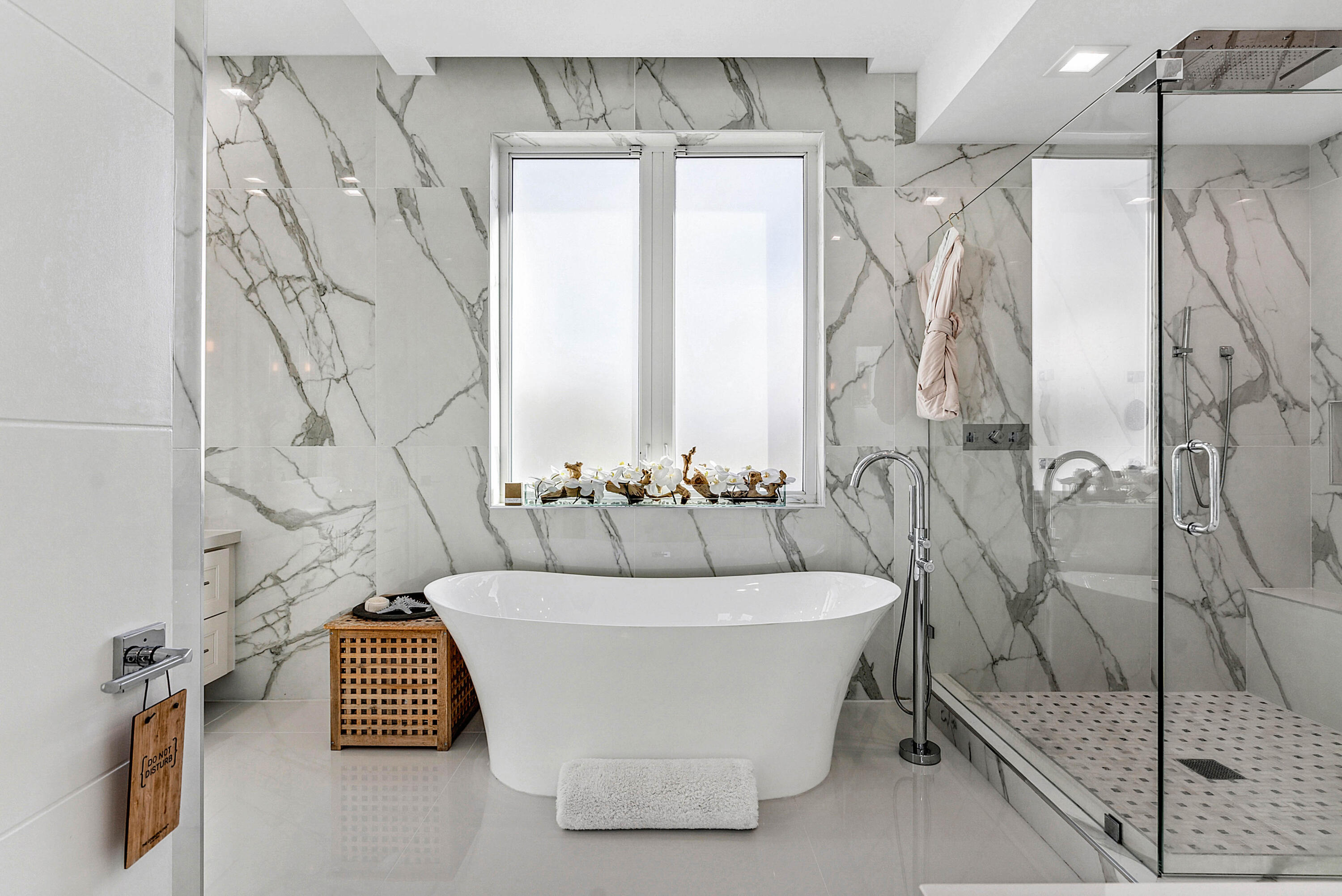 4422 North Hwy A1A Hutchinson Island, FL 34949 - Photo 30 of 86 a white bath tub sitting next to a shower