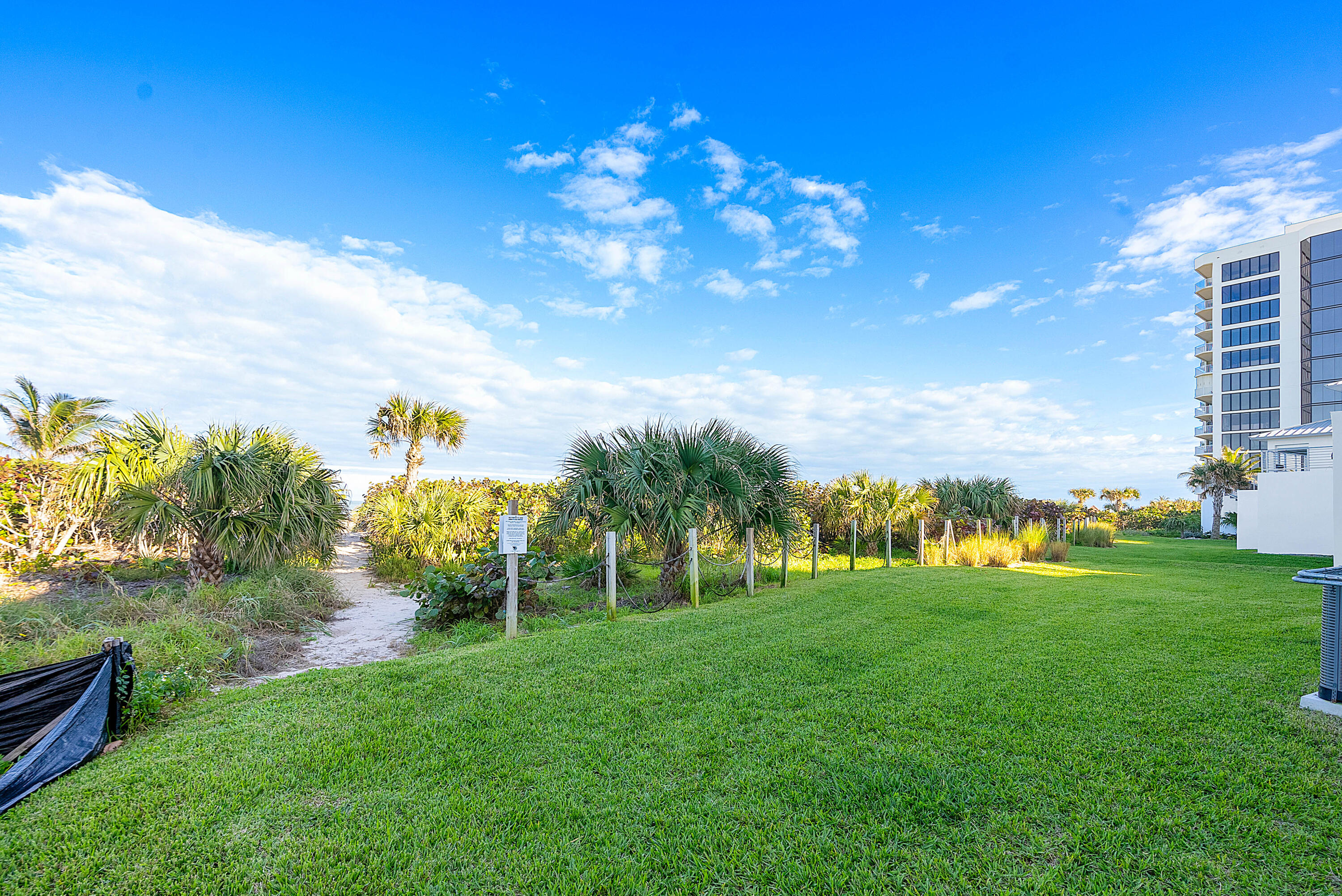 4422 North Hwy A1A Hutchinson Island, FL 34949 - Photo 46 of 86 a view of a golf course with a swimming pool