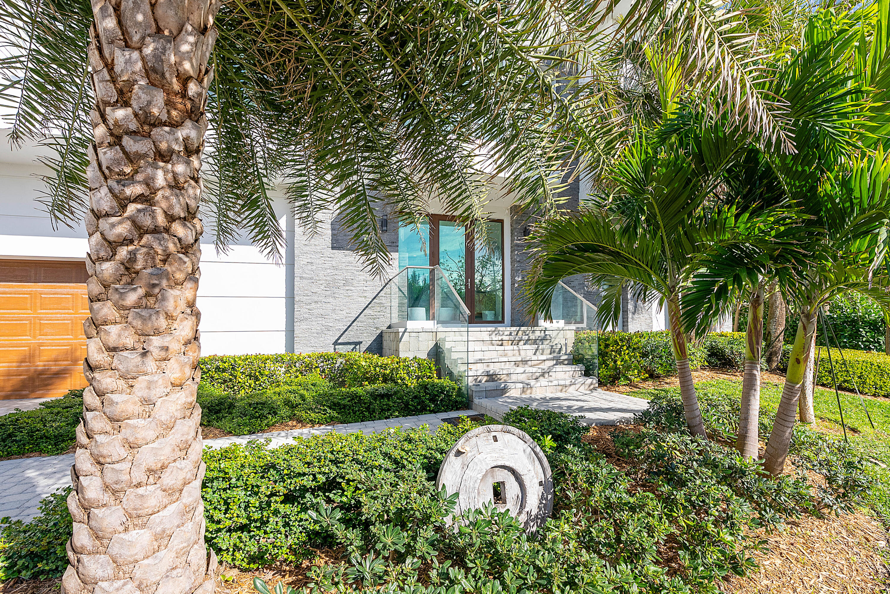 4422 North Hwy A1A Hutchinson Island, FL 34949 - Photo 5 of 86 a view of a house with a backyard and a tree