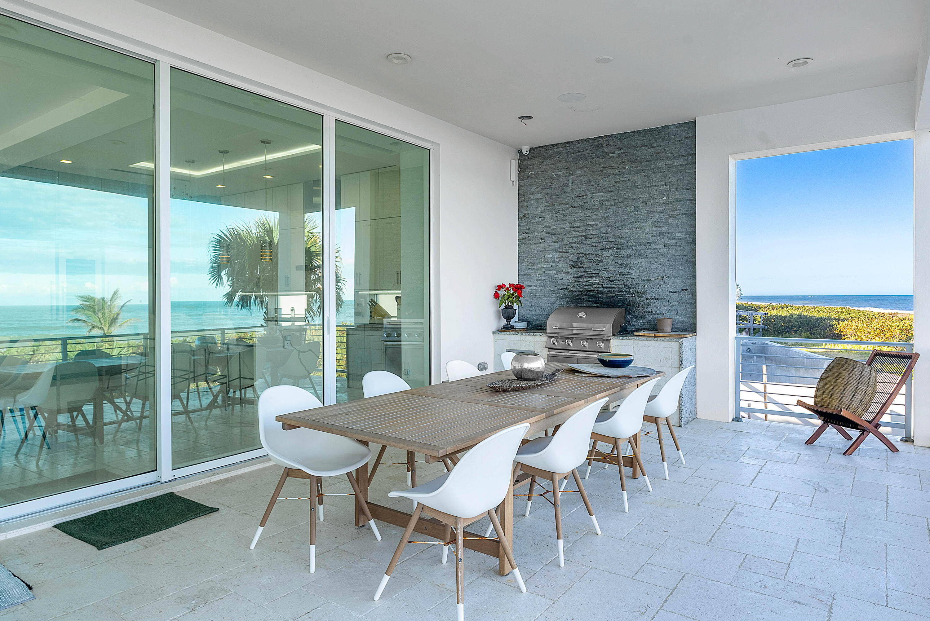 4422 North Hwy A1A Hutchinson Island, FL 34949 - Photo 51 of 86 a view of a dining room with furniture window and outside view