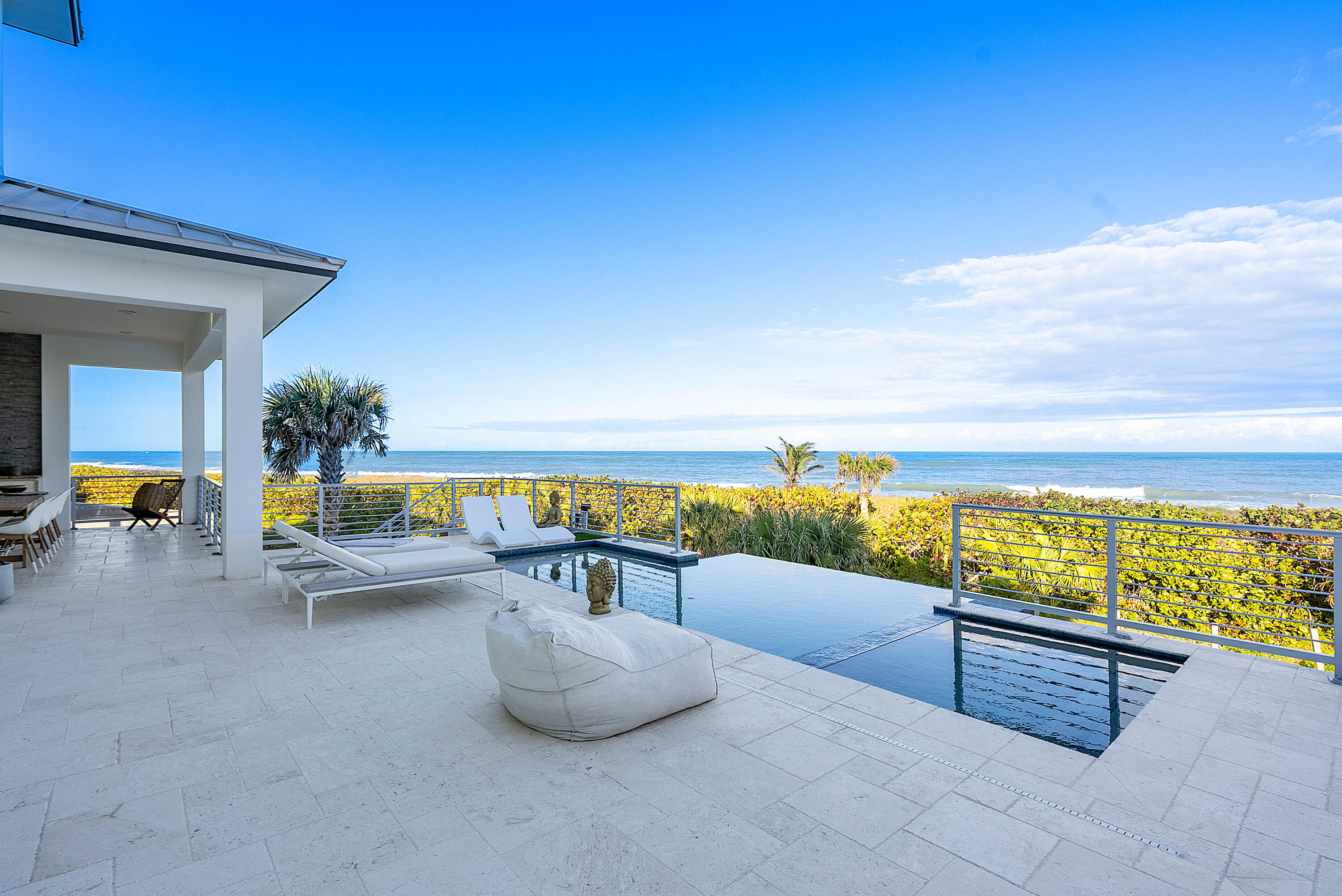 4422 North Hwy A1A Hutchinson Island, FL 34949 - Photo 53 of 86 a view of swimming pool with outdoor seating and a couch