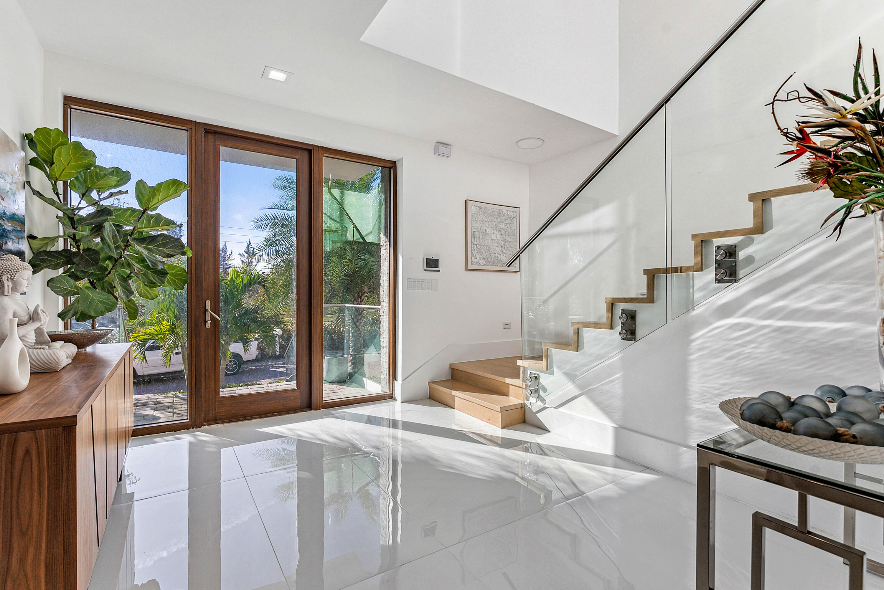 4422 North Hwy A1A Hutchinson Island, FL 34949 - Photo 7 of 86 a living room with furniture and a potted plant