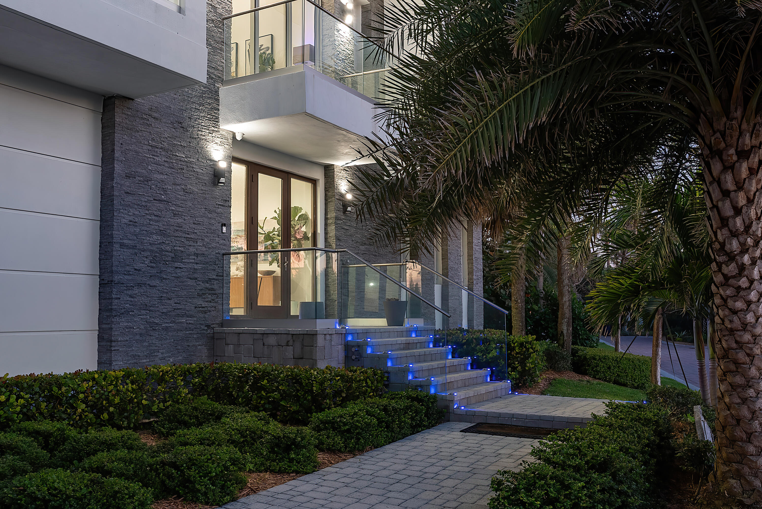 4422 North Hwy A1A Hutchinson Island, FL 34949 - Photo 75 of 86 a front view of a house with a yard