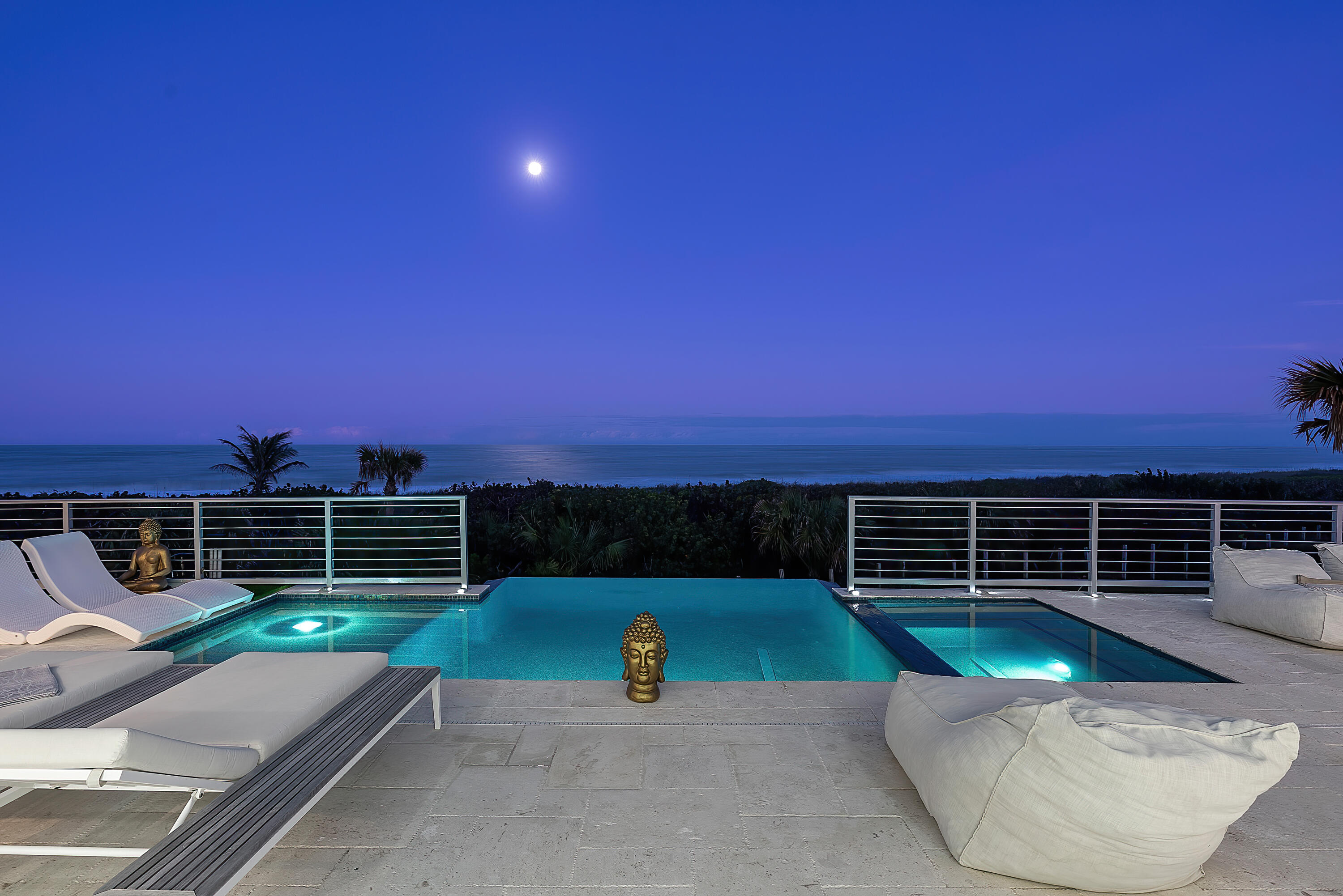 4422 North Hwy A1A Hutchinson Island, FL 34949 - Photo 78 of 86 a view of a terrace with a bench