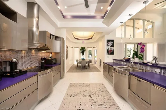 a bedroom with a bed and a television