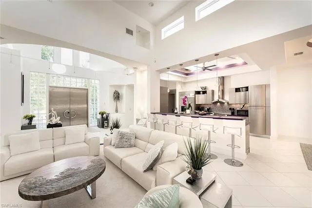 a kitchen with a sink and a stove