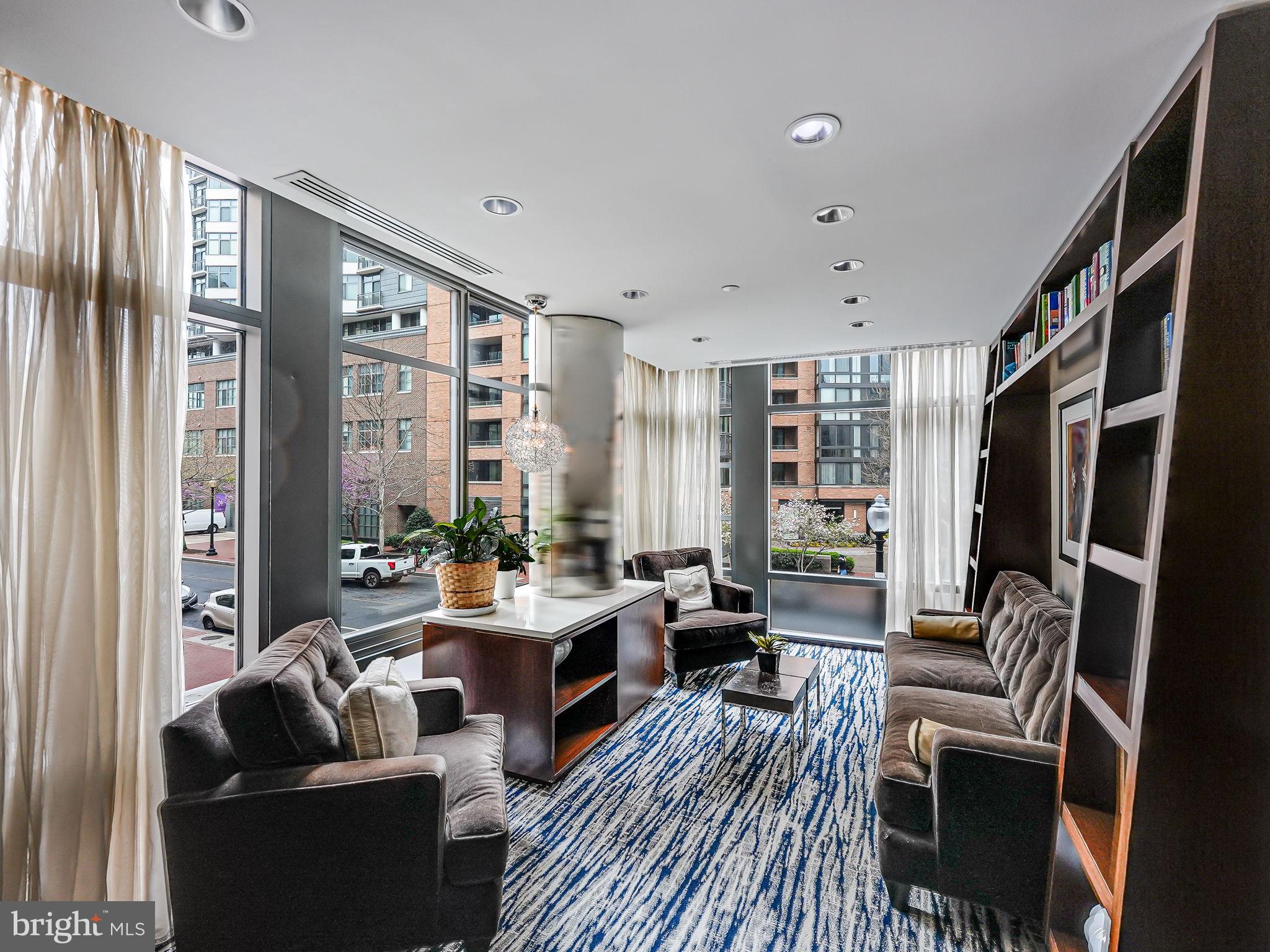 440 L Street Northwest, Unit 809 Washington, DC 20001 - Photo 28 of 50 a living room with furniture and a large window