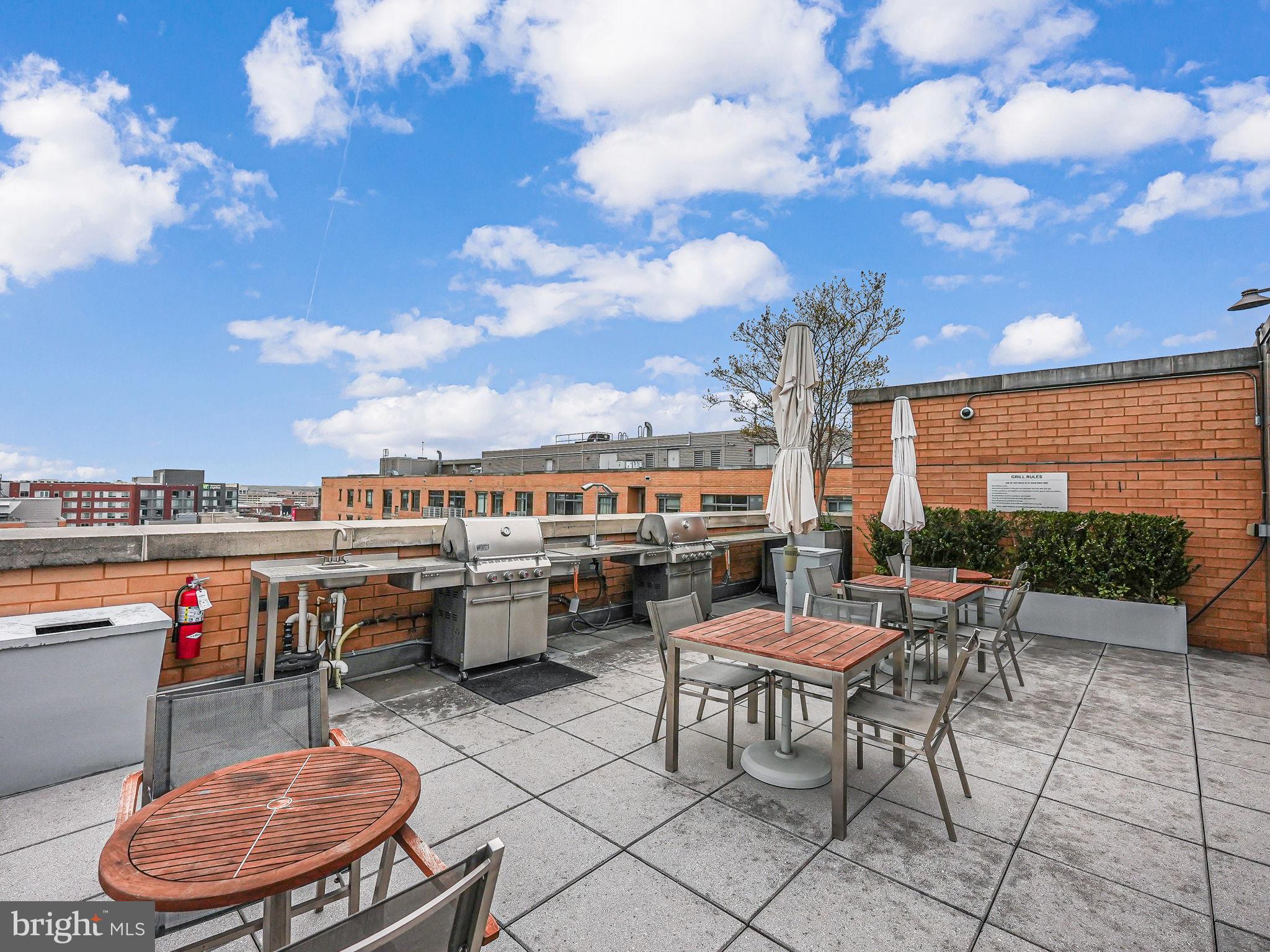 440 L Street Northwest, Unit 809 Washington, DC 20001 - Photo 30 of 50 a outdoor space with patio lots of furniture