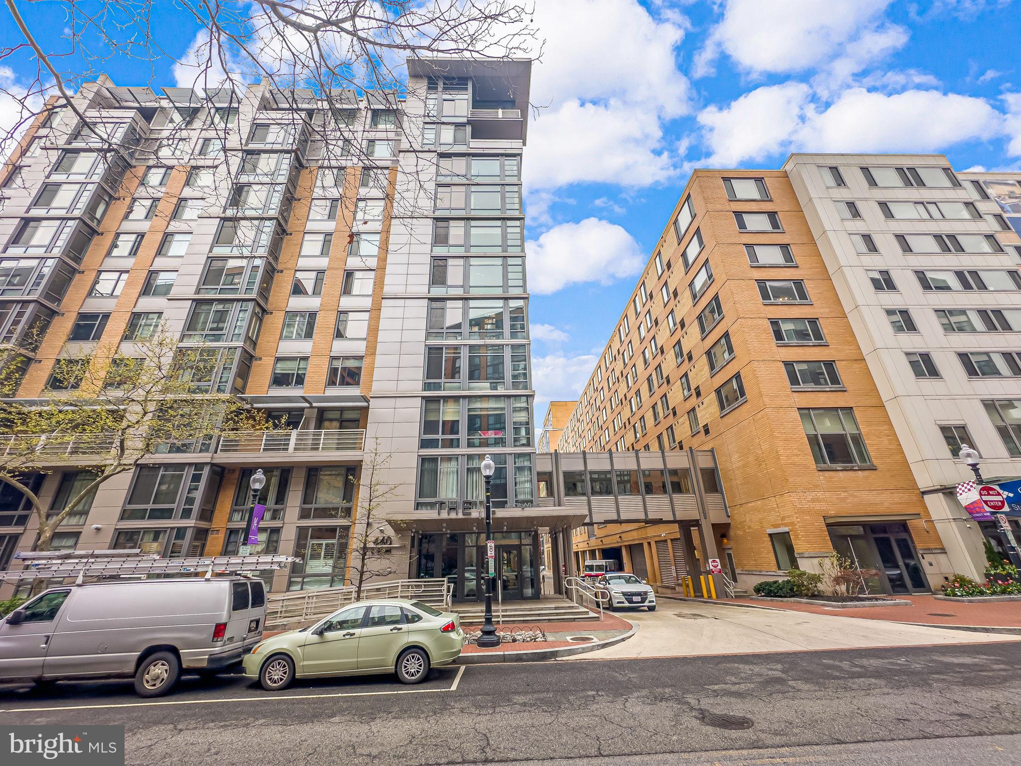 440 L Street Northwest, Unit 809 Washington, DC 20001 - Photo 3 of 50 a car parked in front of a building