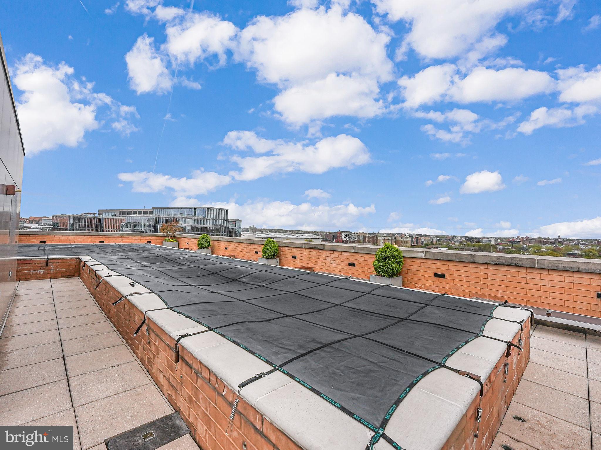 440 L Street Northwest, Unit 809 Washington, DC 20001 - Photo 45 of 50 a view of swimming pool with outdoor seating