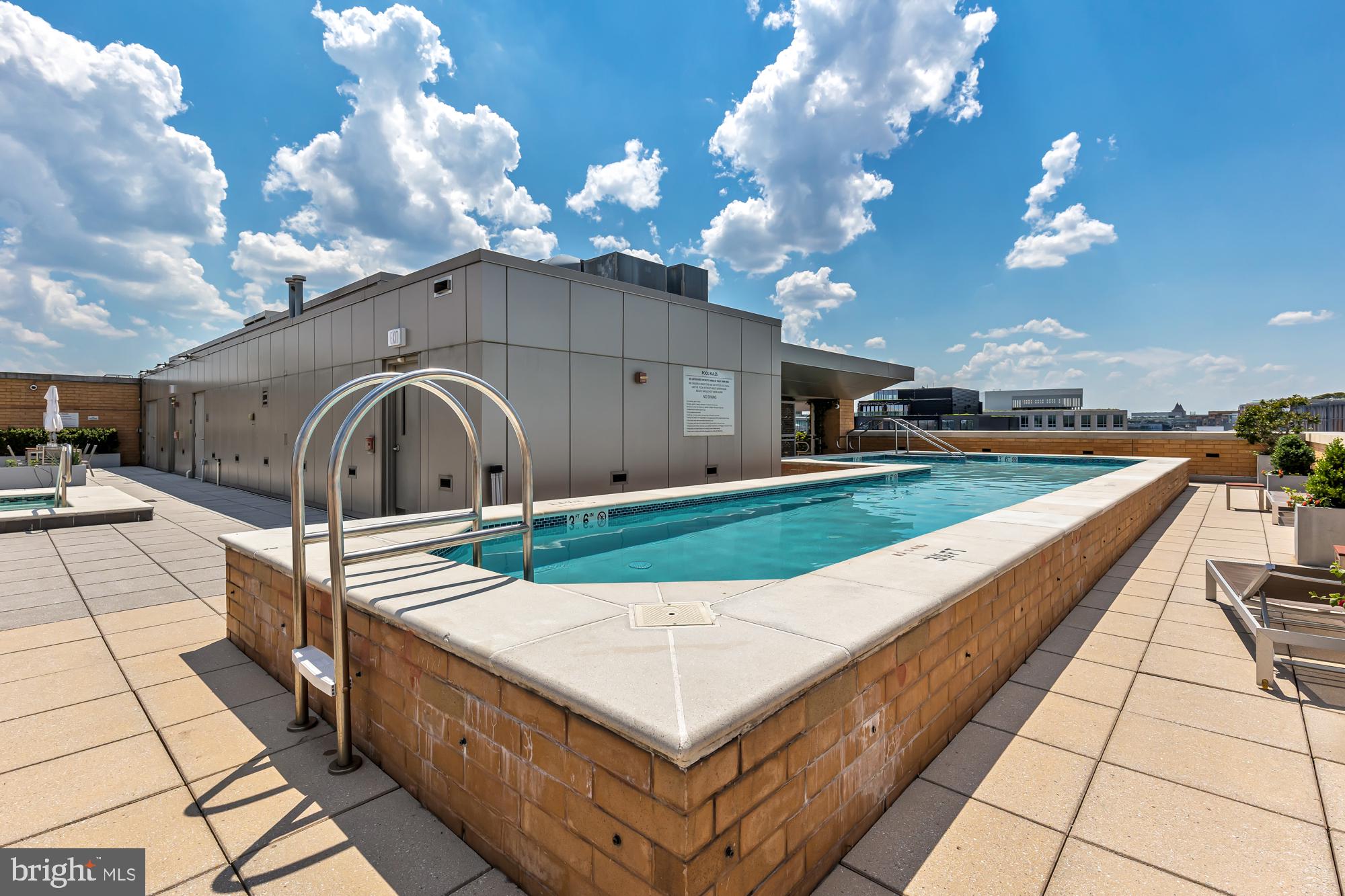 440 L Street Northwest, Unit 809 Washington, DC 20001 - Photo 48 of 50 a swimming pool with yard and outdoor seating